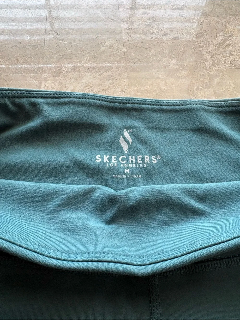1 adidas, 2 Calvin Kline, 1 Sketchers Teal and Black Leggings-lot of 5 in size M